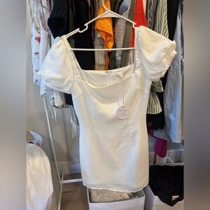 New size xs mini dress from revolve 
Brand is more to come 
New with tags